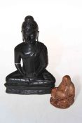 Two antique carved hardwood Buddha's, 18cm and 6cm.