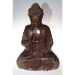 Large carved wood statue of a Buddha, 60cm.