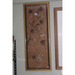 Chinese woven silk panel decorated with birds and tree blossom in gilt glazed frame,
