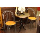 Circular triform bar table and four cafe chairs (5).