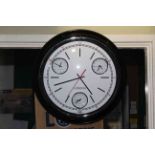 International wall clock, 50cm diameter.