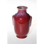 Chinese ox blood vase with blue streak glaze to neck and handles,
