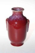 Chinese ox blood vase with blue streak glaze to neck and handles,