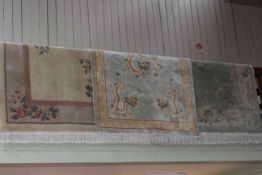 Three various Chinese rugs, 2.50 by 1.57, 2.50 by 1.54 and 1.88 by 1.24.