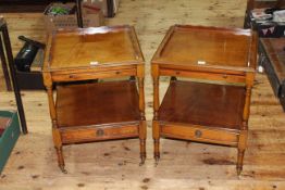 Pair line inlaid two tier side tables having frieze slides and base drawers, 65cm by 48cm by 48cm.