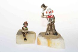 Two painted metal clown figures on onyx bases both marked RON © 79 & 82.