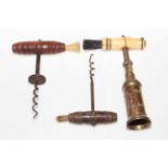 Early 19th Century brass and ivory corkscrew with brush, and two further antique corkscrews (3).