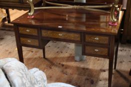 Edwardian mahogany and line inlaid five drawer writing desk raised on square tapering legs,