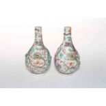 Pair antique Chinese vases, the bodies with relief dragons and painted bats, blue vases, 13cm.