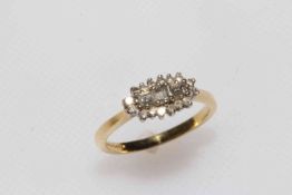 18 carat gold and diamond cluster ring set with baguettes and brilliants, size N.