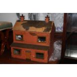 Dolls house and small amount of dolls house furniture.