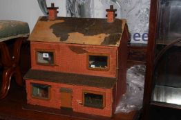 Dolls house and small amount of dolls house furniture.