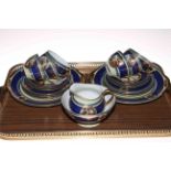 Continental porcelain twenty two piece tea service decorated with classical scenes.
