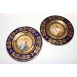 Pair Vienna porcelain cabinet plates painted with maiden and cherubs signed Garner,