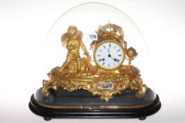 Highly ornate gilt metal mantel clock mounted with wing cherub,