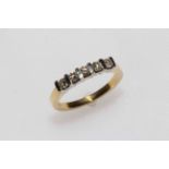 18 carat gold and five stone diamond ring, size M.