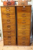 Pair early 20th Century seven drawer filing cabinets, 134cm by 46cm by 56cm.