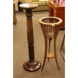 Mahogany carved column torchere and Edwardian mahogany plant stand.