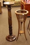 Mahogany carved column torchere and Edwardian mahogany plant stand.