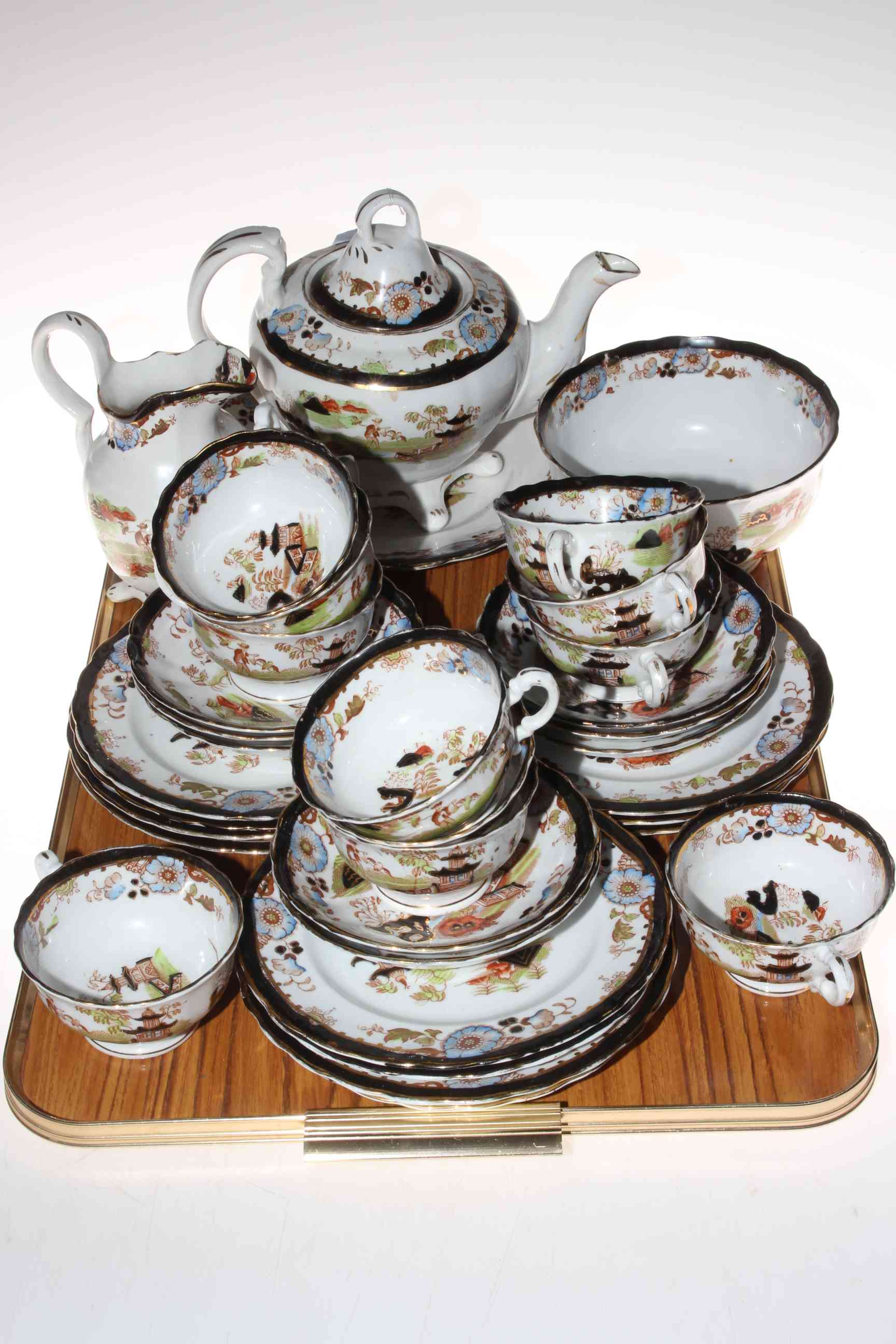 19th Century thirty four piece part tea service decorated with Oriental landscape,