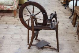 Vintage wooden spinning wheel, 86cm by 73cm.