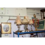 Collection of five table lamps, gilt candle holder and three gilt framed pictures.