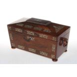 Rosewood and mother or pearl inlaid tea caddy with two compartment boxes and glass, 33cm by 15cm.