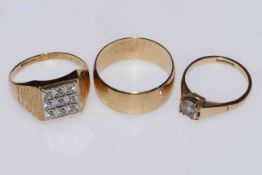 9 carat gold wedding ring and two other 9 carat gold rings (3).