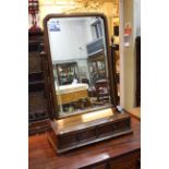 Mahogany two drawer toilet mirror, 84cm by 56cm by 24.5cm.