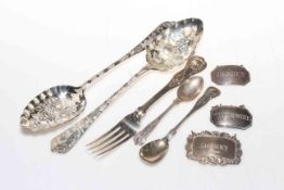 Three decanter labels, two berry spoons, two silver spoons and fork (8).
