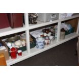 Full shelf of Oriental china, collectors plates, linen, stoneware, hotwater bottle, etc.