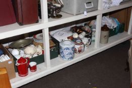 Full shelf of Oriental china, collectors plates, linen, stoneware, hotwater bottle, etc.