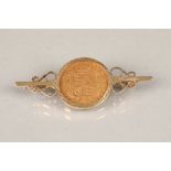 Victorian gold half sovereign mounted to a bar brooch, dated 1882. Total weight 6.4g