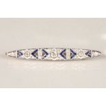 Art Deco diamond and sapphire brooch, central old cut diamond approx. 0.50 carats flanked either