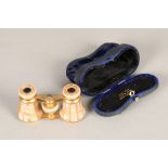 Pair of Tiffany & Co mother of pearl opera glasses with case, inscribed Tiffany & Co, Union