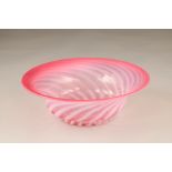 Cranberry glass swirl bowl, 30cm diameter