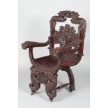 Early 20th century Chinese carved rosewood dragon chair, probably republic period 1910-30. 67cm wide