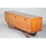 20th century teak sideboard, three sets of cupboards below three fitted drawers. 229cm long 48cm