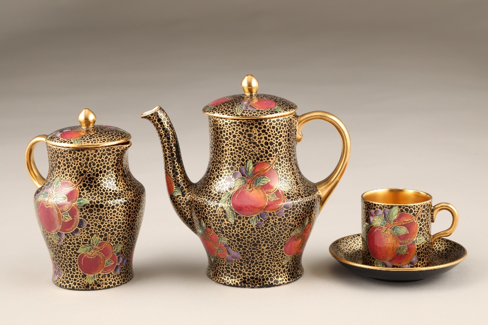 Fifteen piece Maling lustre coffee set, plum and berry, pattern 3615, gilt interiors and handles.