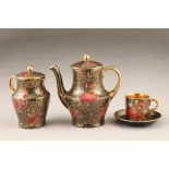 Fifteen piece Maling lustre coffee set, plum and berry, pattern 3615, gilt interiors and handles.