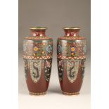 Pair Japanese cloisonne vases, baluster form, chestnut brown ground with shield shaped panels of