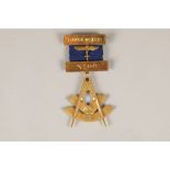 Boxed 9 carat gold Masonic medal, square and compass with a single mounted sapphire, Lodge Osiris