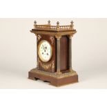 19th century French bronzed and gilt metal mantel clock white enamelled dial, decorated with flowers