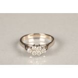 Ladies 18ct white gold diamond cluster ring, set with six round brilliant cut diamonds each