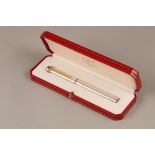 Must de Cartier silver and gilt fountain pen, boxed in a presentation case with guarantee card and