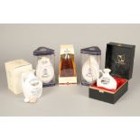 Two Dimple Scotch whisky souvenir decanters, 75cl 43% volume. Bells Millenium Scotch Whisky with