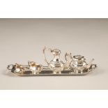 Five piece miniature silver tea and coffee service, including a tray, tea and coffee pot, sugar