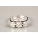 Three stone diamond ring, central stone 0.75 carat diamond flanked either side by a 0.5 carat