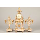 19th/20th century three piece French marble and ormolu clock set, mantel clock supported on four
