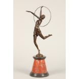 Fine modern art deco bronze lady figure, 'The hoop dancer' after Bruno Zach, raised on a black and